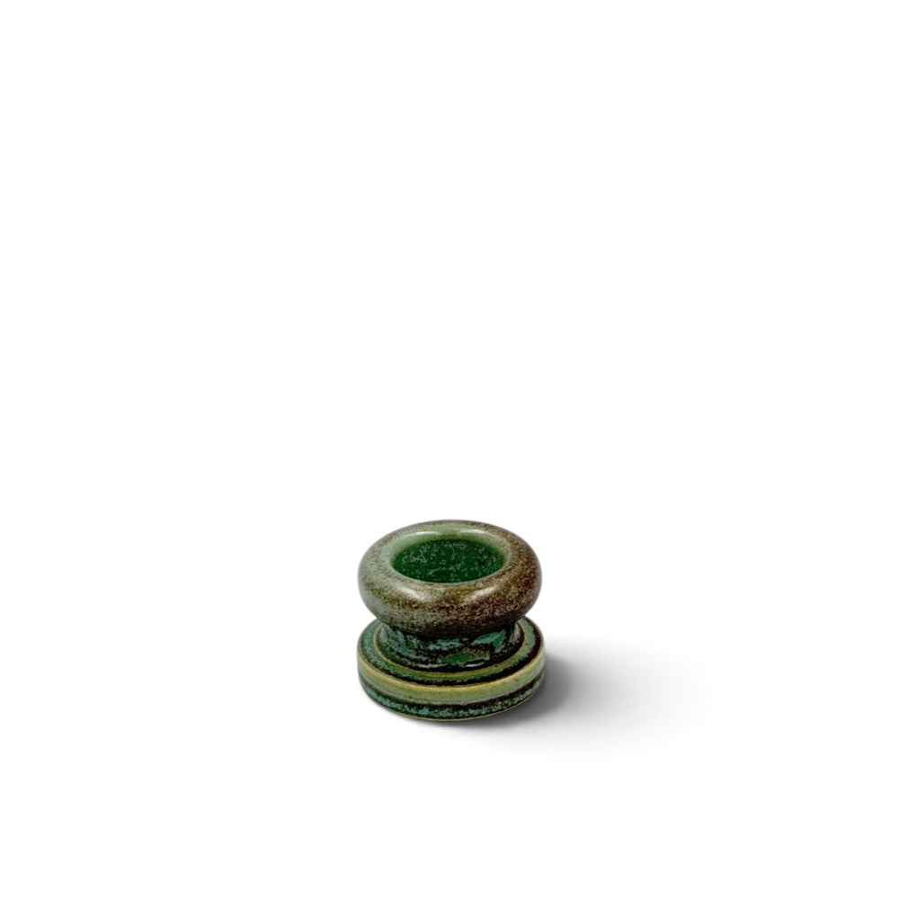 Green and brown ceramic candle holder